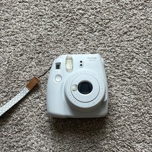 *on hold until 8/6*. Poloroid camera